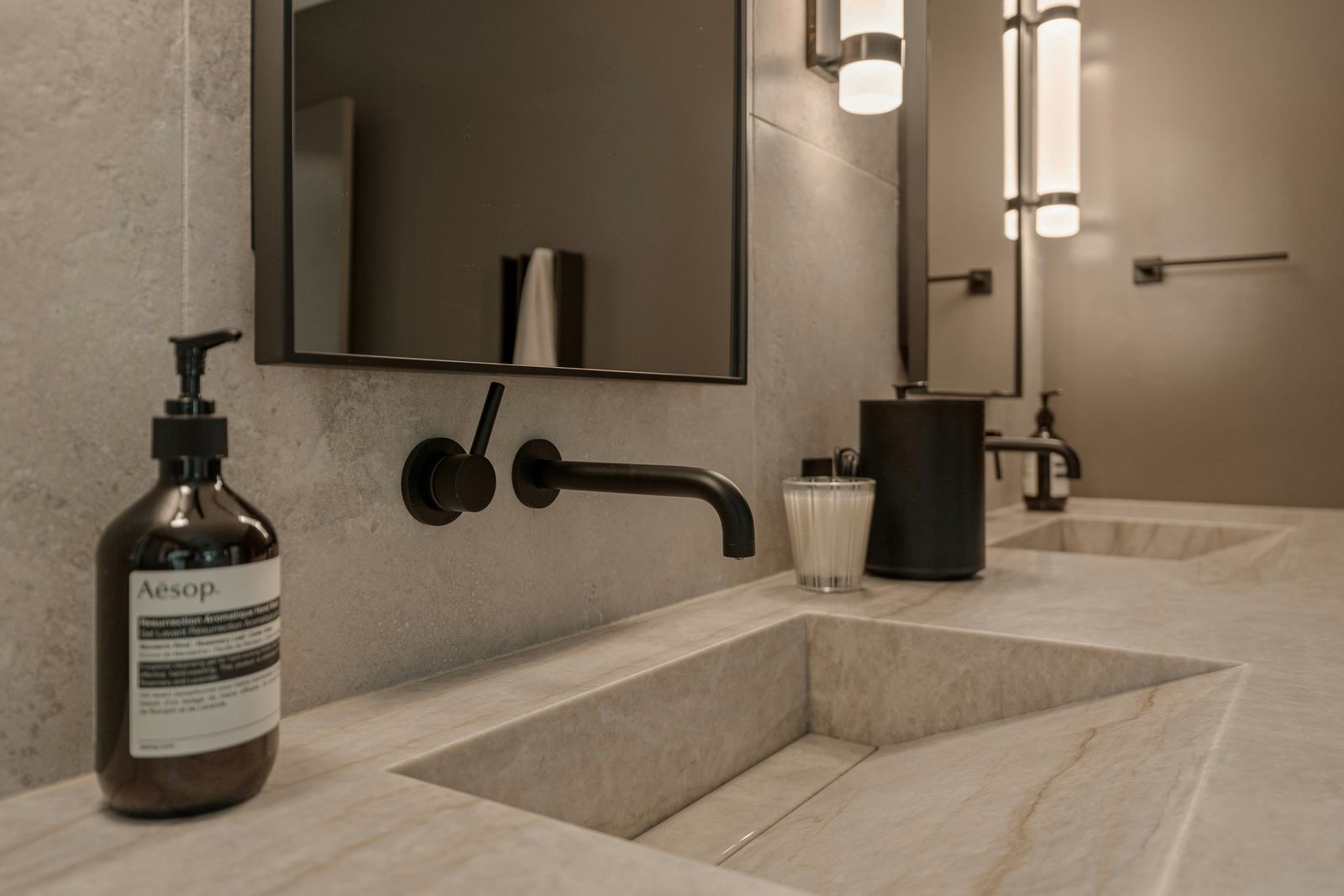 A stone basin in a freshly cleaned bathroom