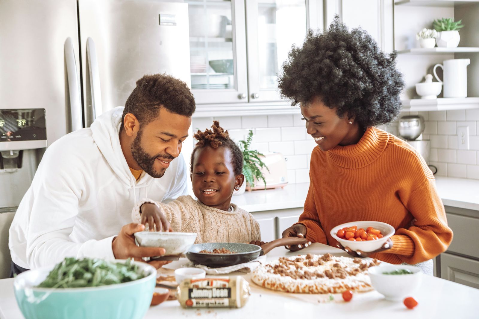 A family at home in a freshly cleaned kitchen