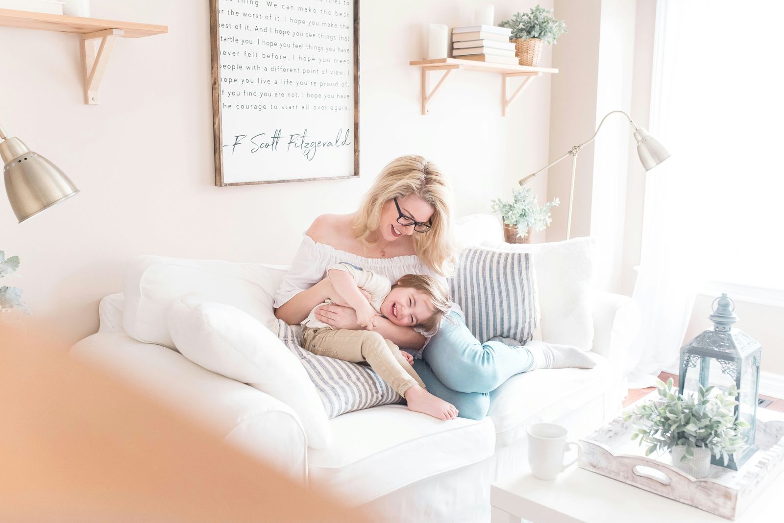 A family at home, relaxed on the sofa
